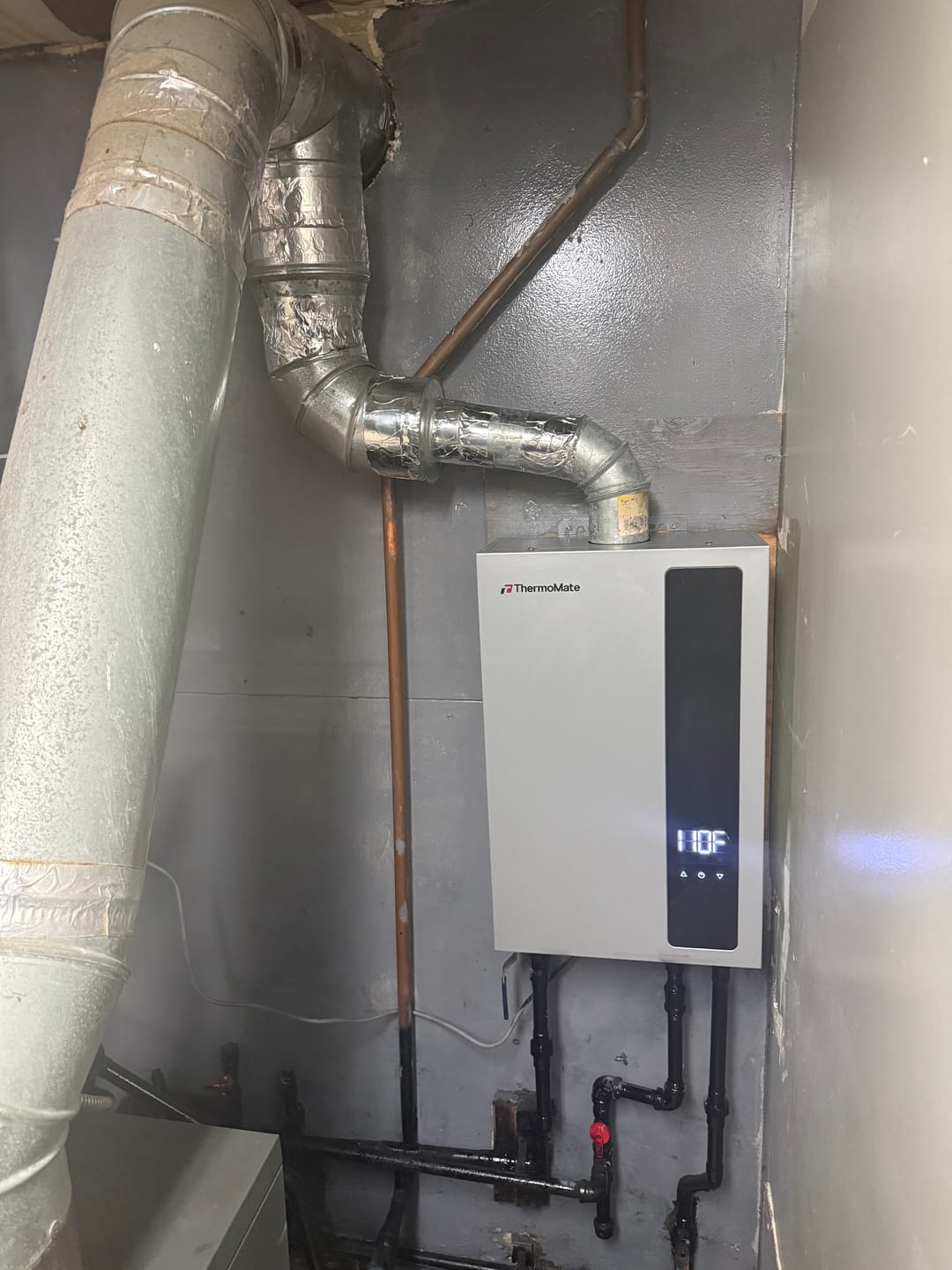 Customer photo review of 4.05 GPM Residential Natural Gas Tankless Water Heater