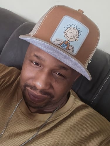 Customer photo review of OVERLORD X Peanuts: Pigpen Trucker Cap