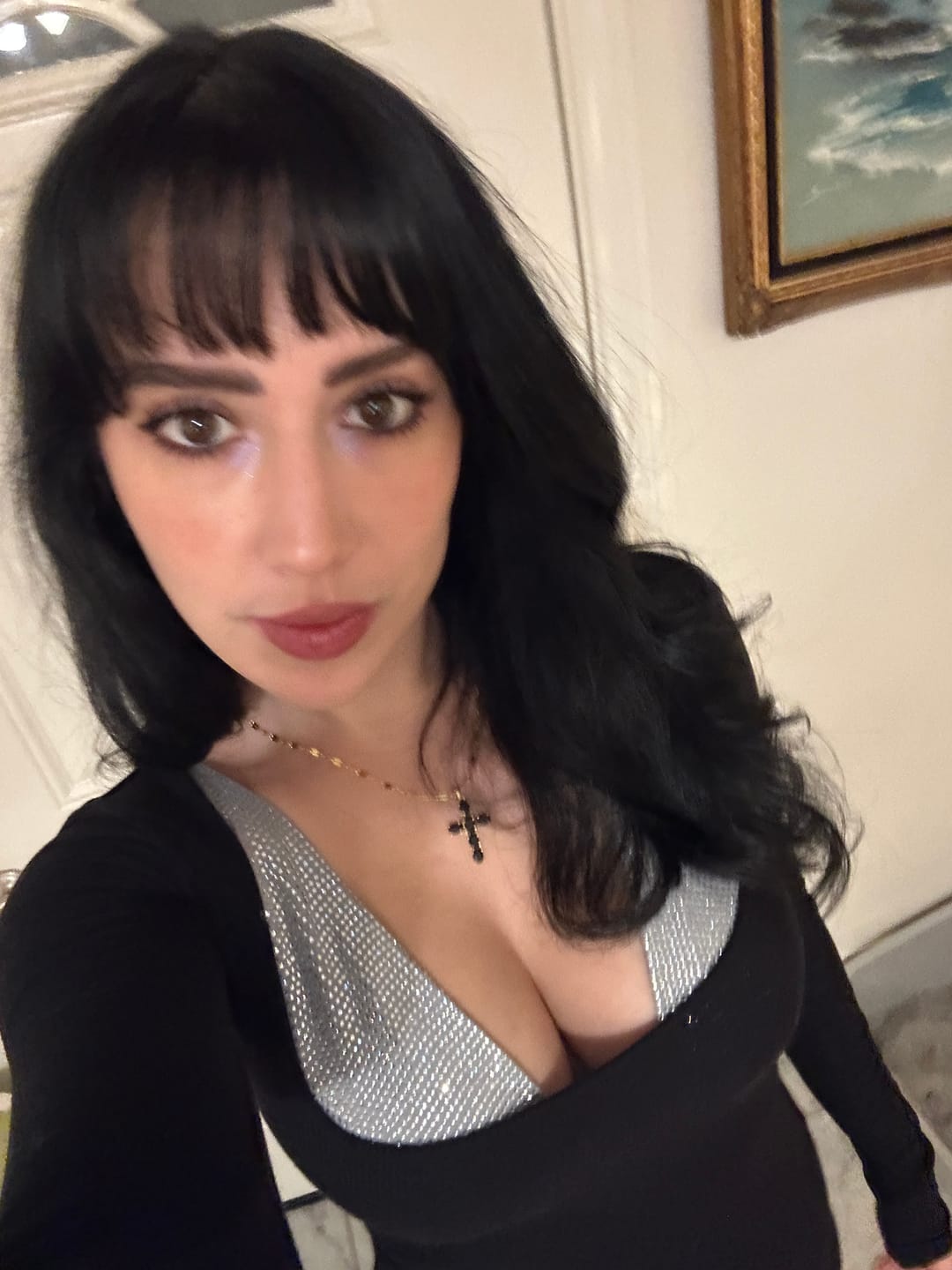Customer photo review of Noir Cross Necklace