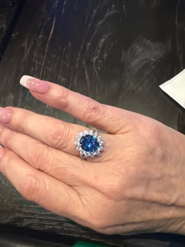Customer photo review of 4.0Ct Halo Oval Cut Blue Stone Split Shank Engagement Ring In Sterling Silver