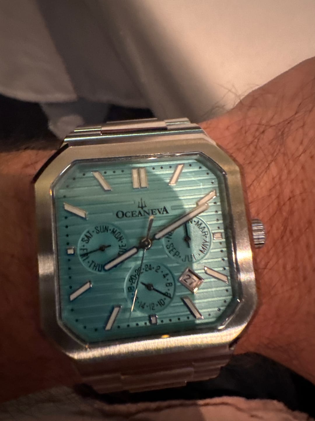 Customer photo review of Oceaneva Mens Tenuis Automatic Calendar Thin Watch Teal Dial