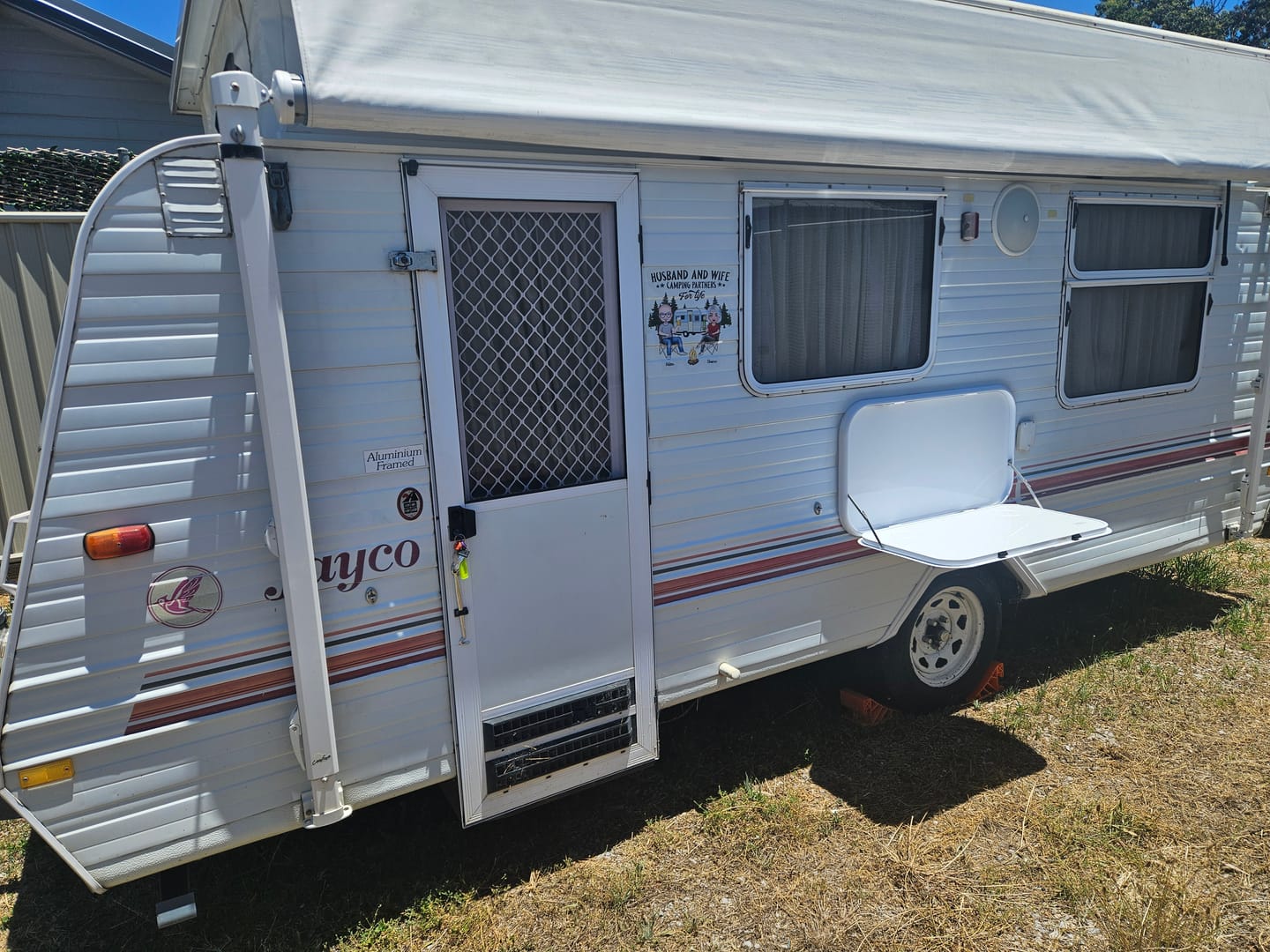 Customer photo review of Camping Partners For Life Doll Couple Sitting Personalized RV Decal