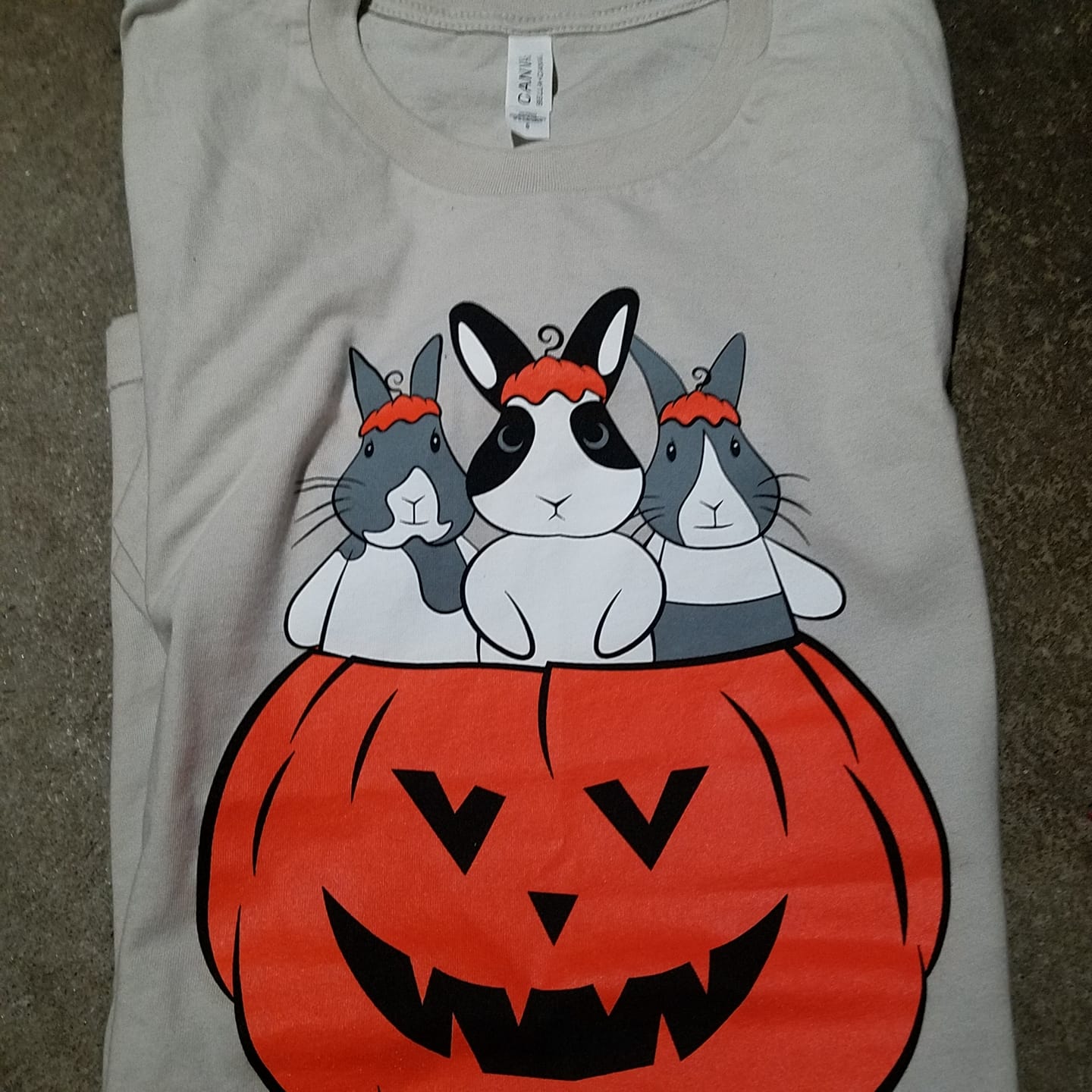 Customer photo review of Binky Pumpkin Tee 🎃