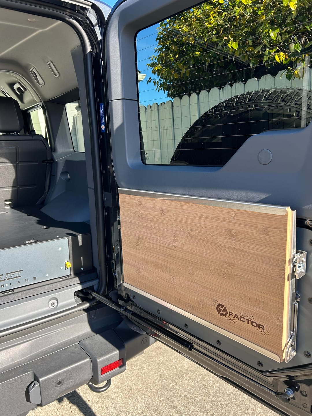 Customer photo review of Ineos Grenadier V2 Folding Tailgate Table with Extended Storage Cubby