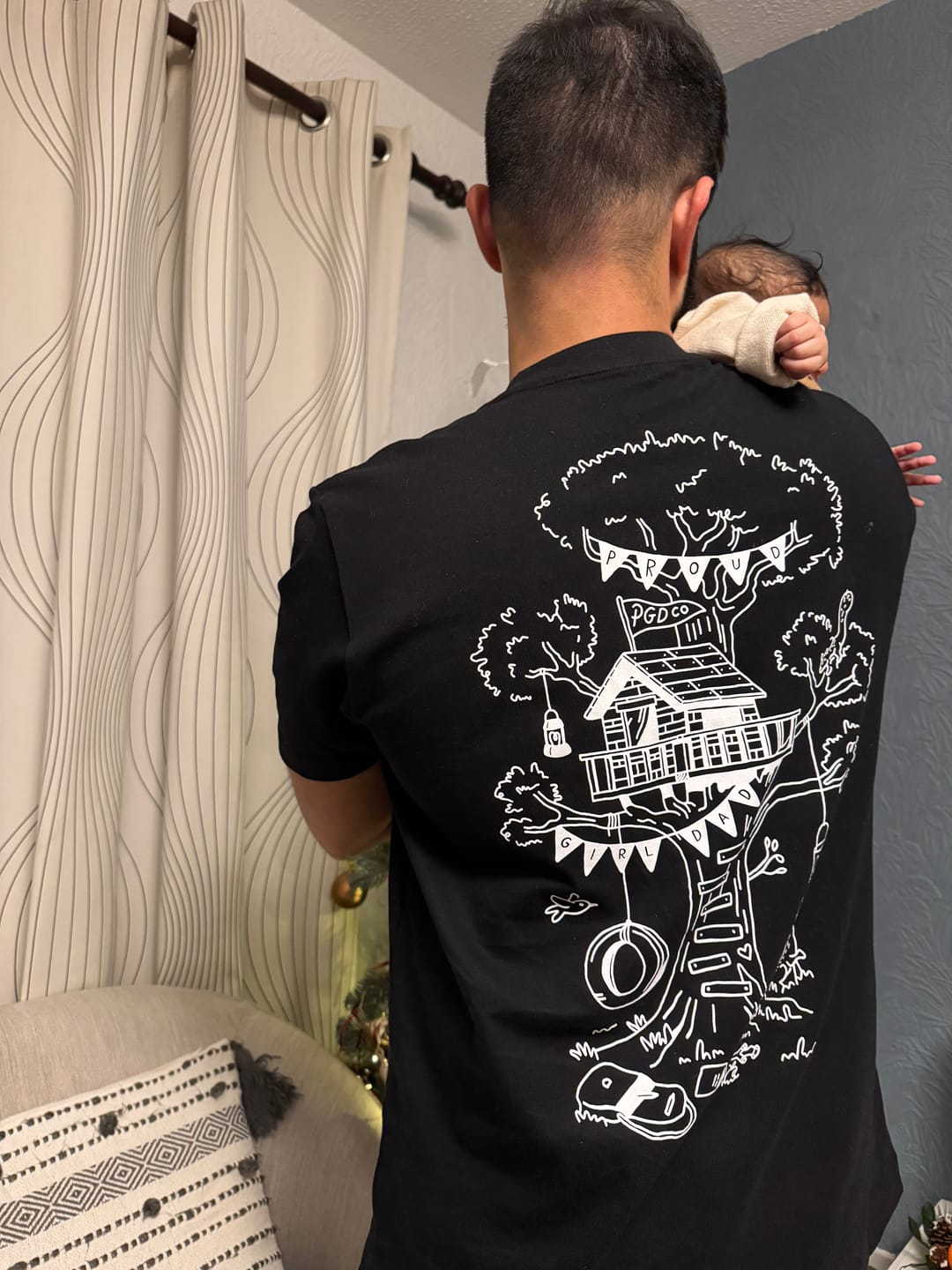 Customer photo review of Founder Tee