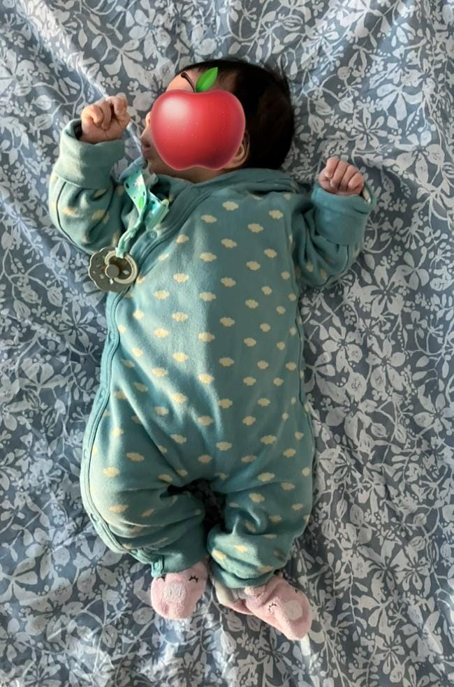 Customer photo review of Fluffy Cloud Reversible Hooded Snug As A Bug Suit
