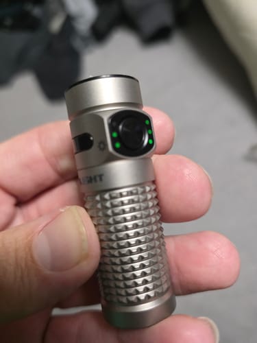Customer photo review of OLIGHT BATON4KITTI Baton 4 Powerful EDC Flashlight 1300 Lumens - Ti-Premium (With Charging Case)