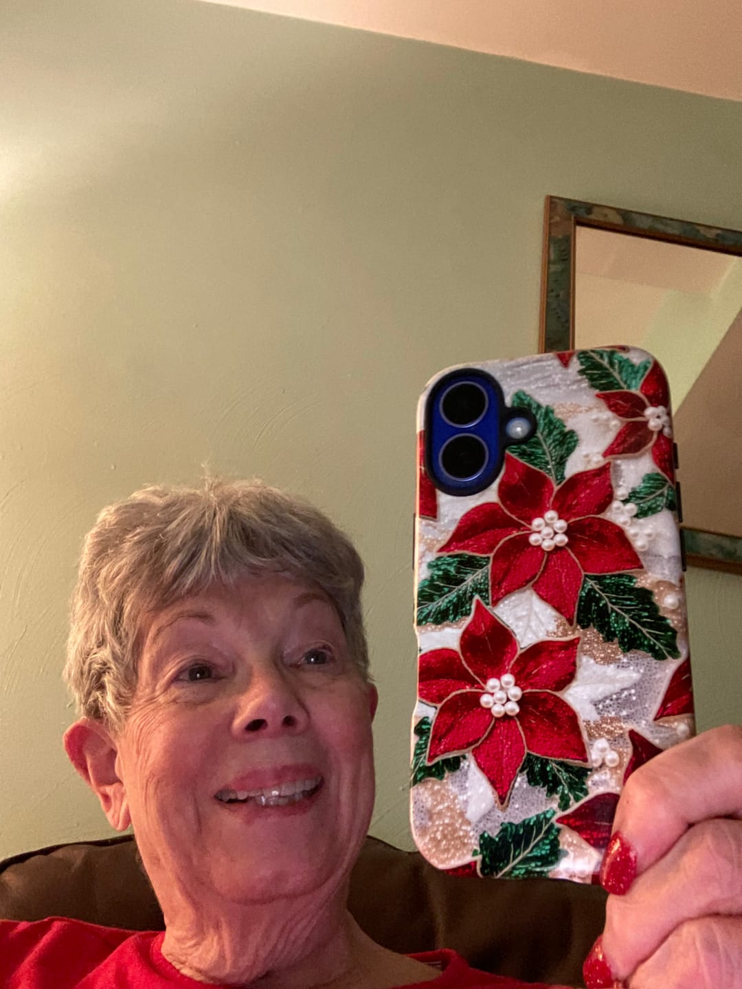 Customer photo review of Christmas Poinsettia Flower Design iPhone Case