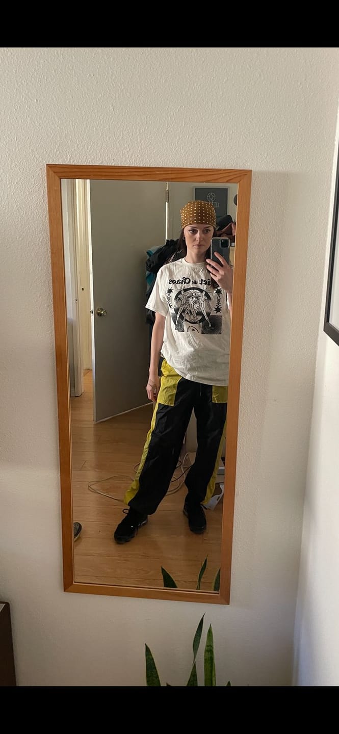 Customer photo review of Quiet The Chaos Tee