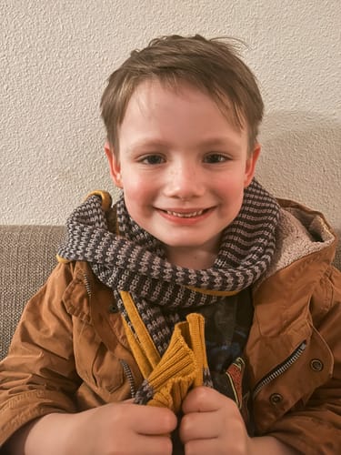 Customer photo review of Dreamy Blue Striped Knitted Scarf