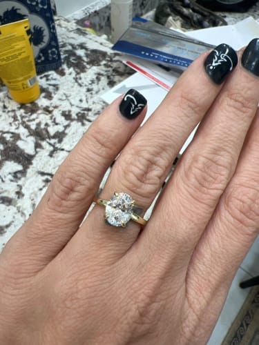 Customer photo review of Oval Hidden Halo Engagement Ring