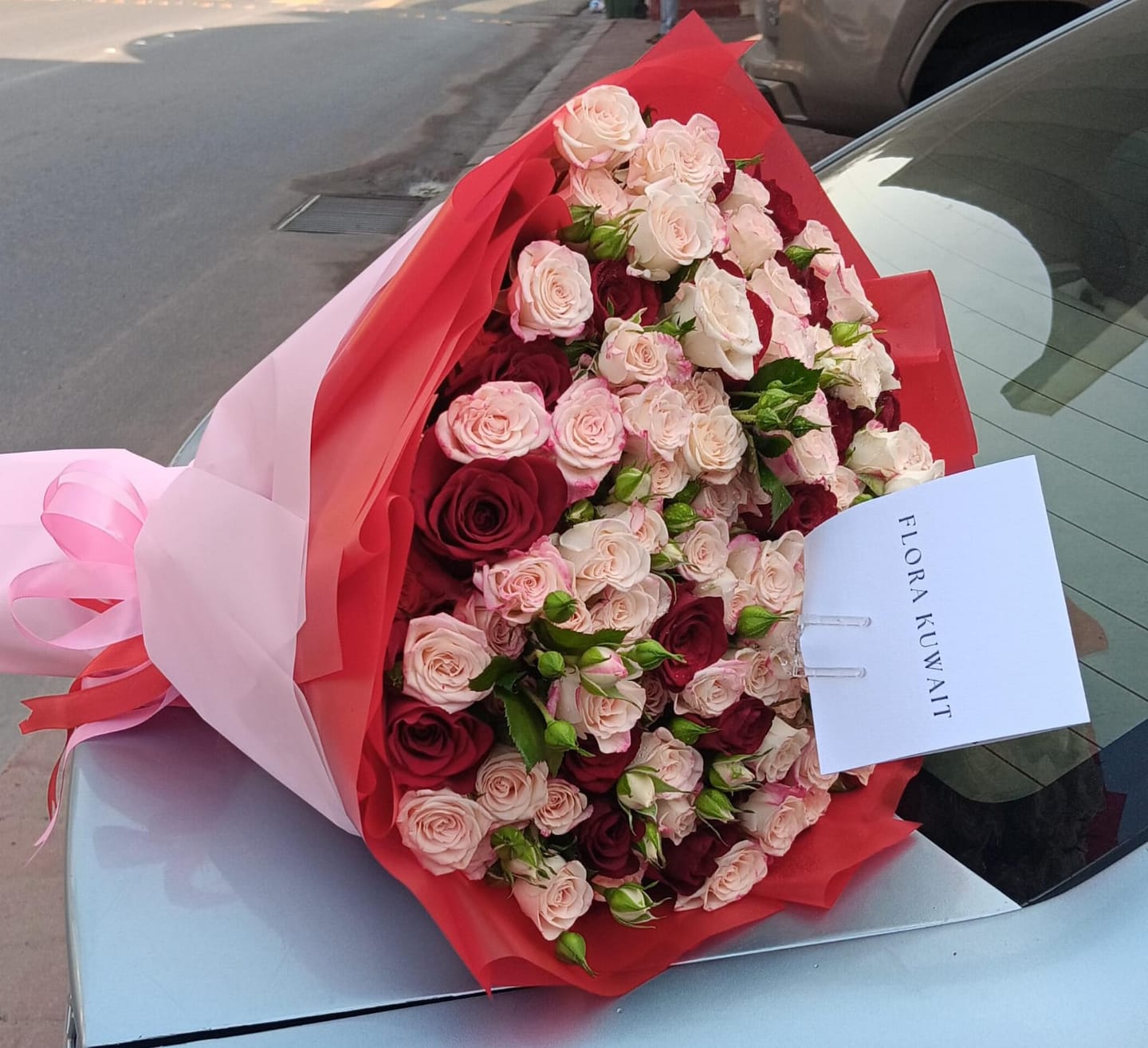 Customer photo review of Romantic Red & Pink Spray Roses Bouquet