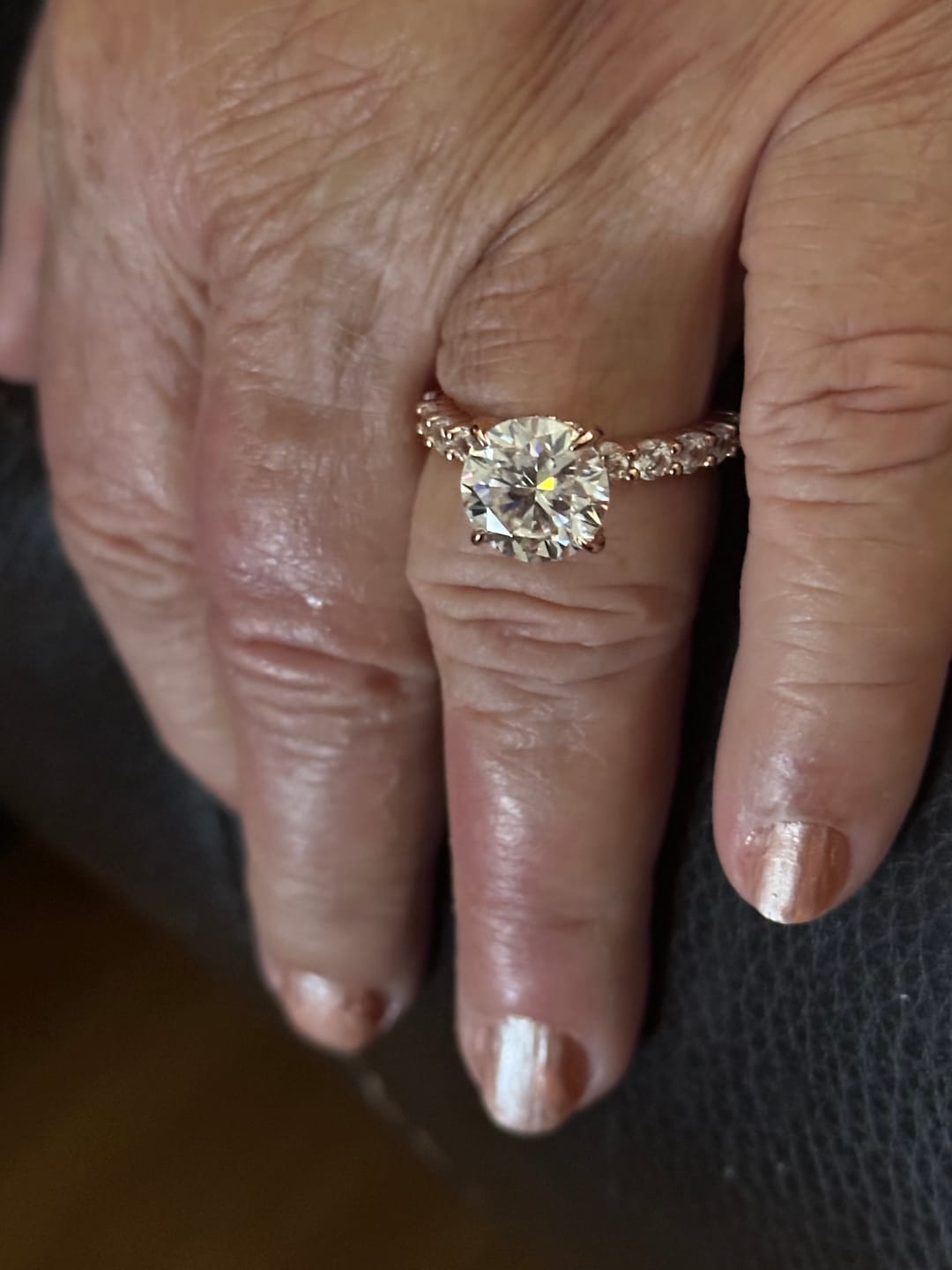 Customer photo review of Rodiffy Moissanite 4.0 Ct Round Rose Gold Engagement Ring