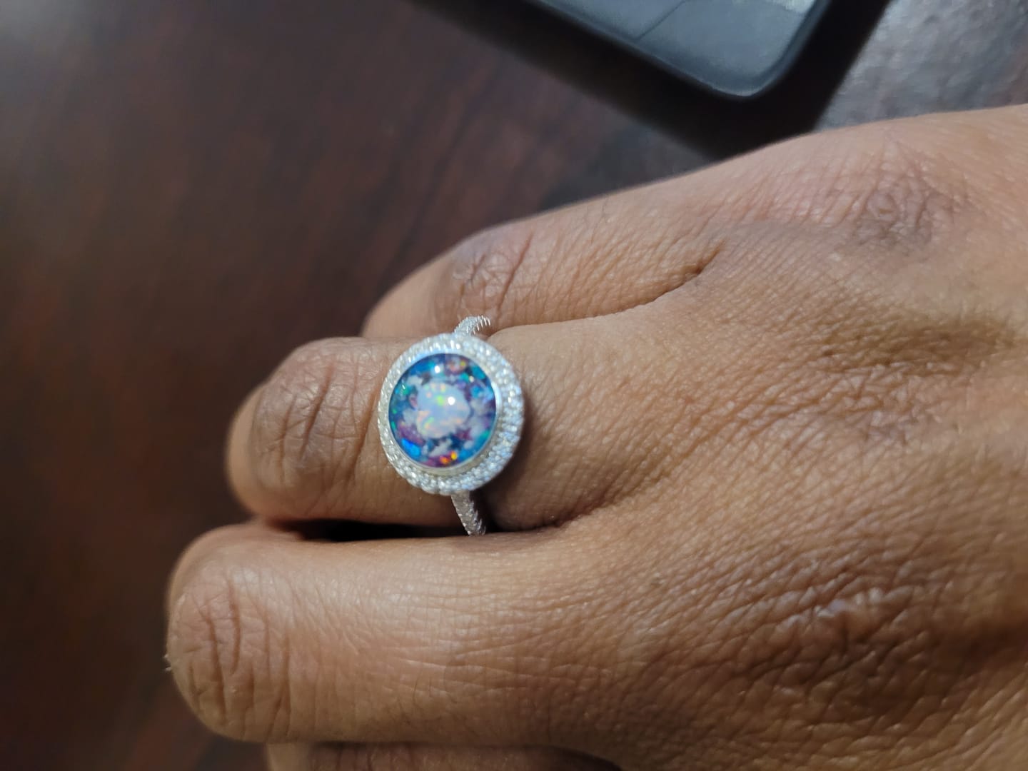 Customer photo review of Bedazzled Circle with Heart Opal Cremation Ring