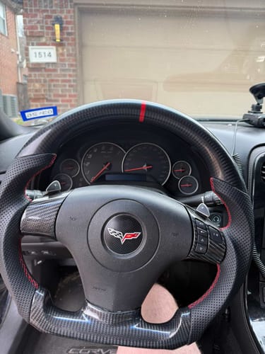 Customer photo review of Genuine Carbon Fiber Steering Wheel With Button Trim For C6 Corvette 2006-2011