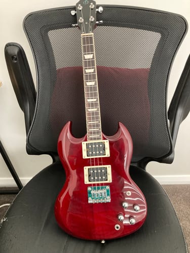 Customer photo review of PIONEERTCR Flight Pioneer Tenor Ukulele Transparent Red Steel String Solid Body Electric Ukulele with Deluxe 20mm padded gig bag.