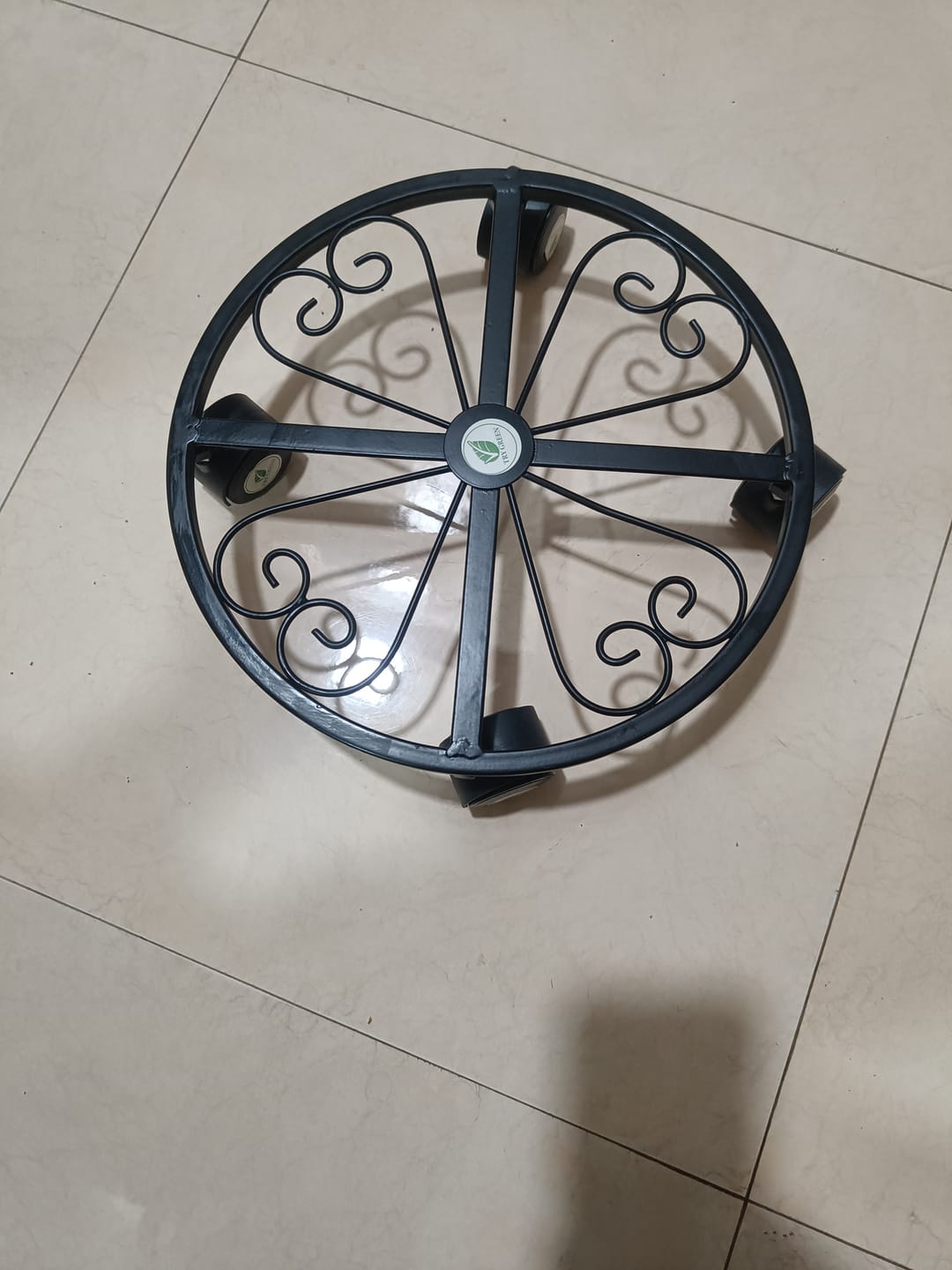 Customer photo review of TryGreen Luna Wheel Rolling Plant Stand for Planters