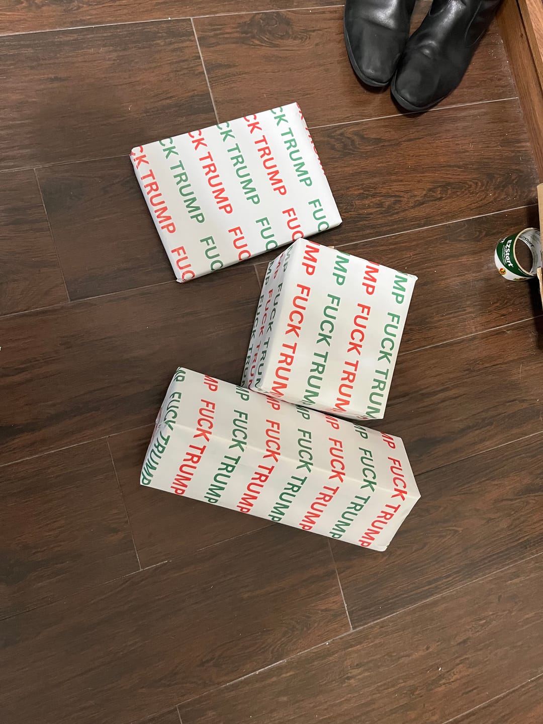 Customer photo review of Fuck Trump Holiday Wrapping Paper