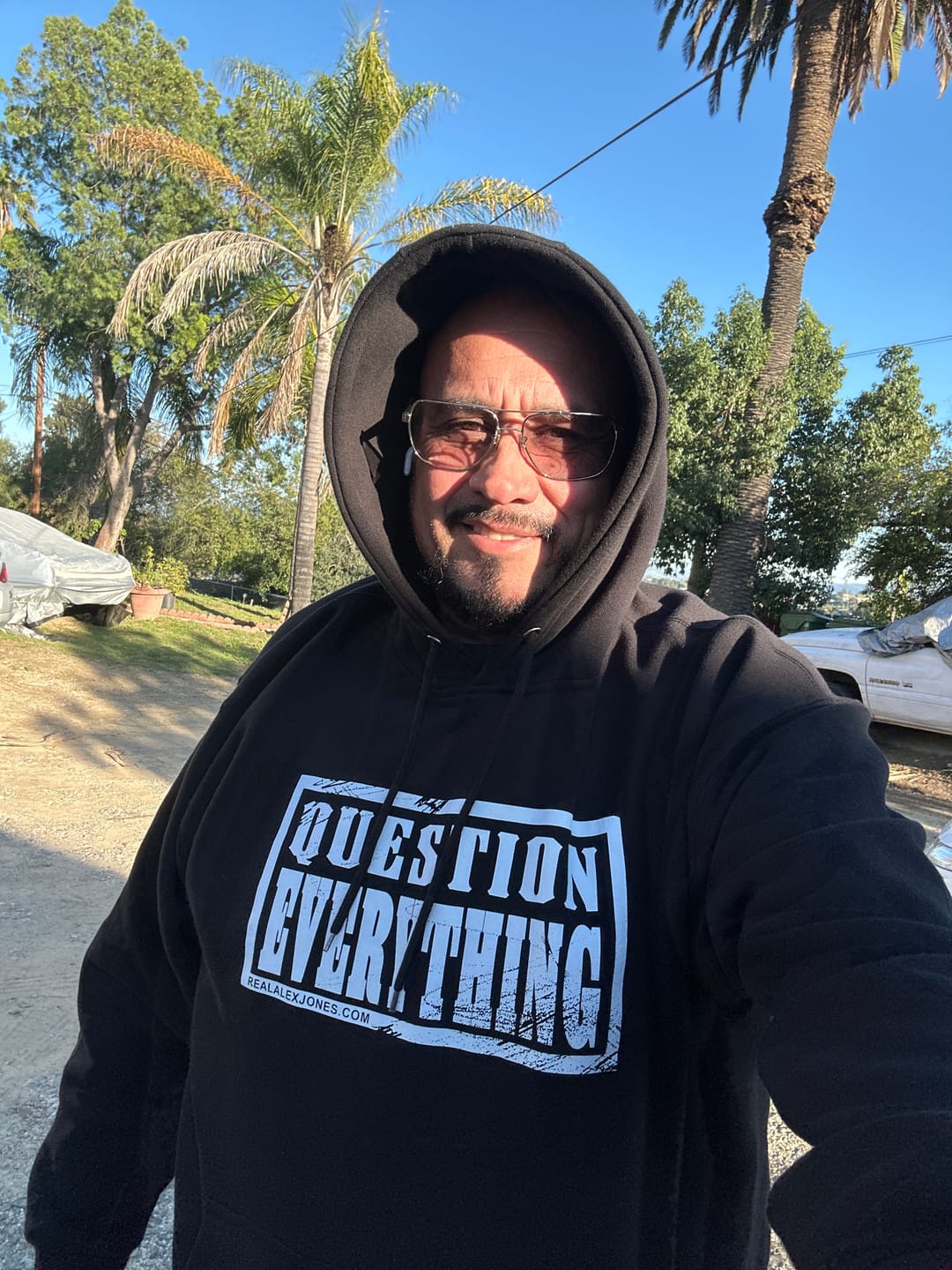 Customer photo review of Question Everything Hoodie