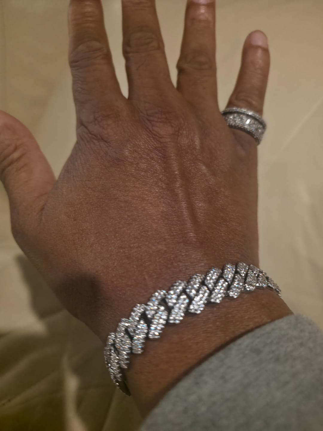 Customer photo review of 12mm Iced Prong Cuban Link Bracelet