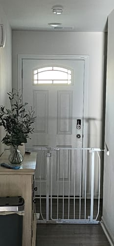 Customer's white door with the Arch Top Fanlite glass kit installed, brightly illuminating the hallway.