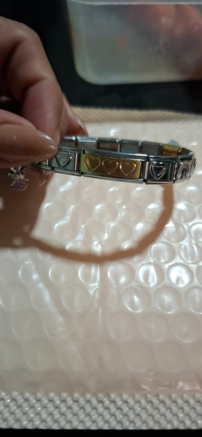 Customer photo review of Charm Doble Corazones