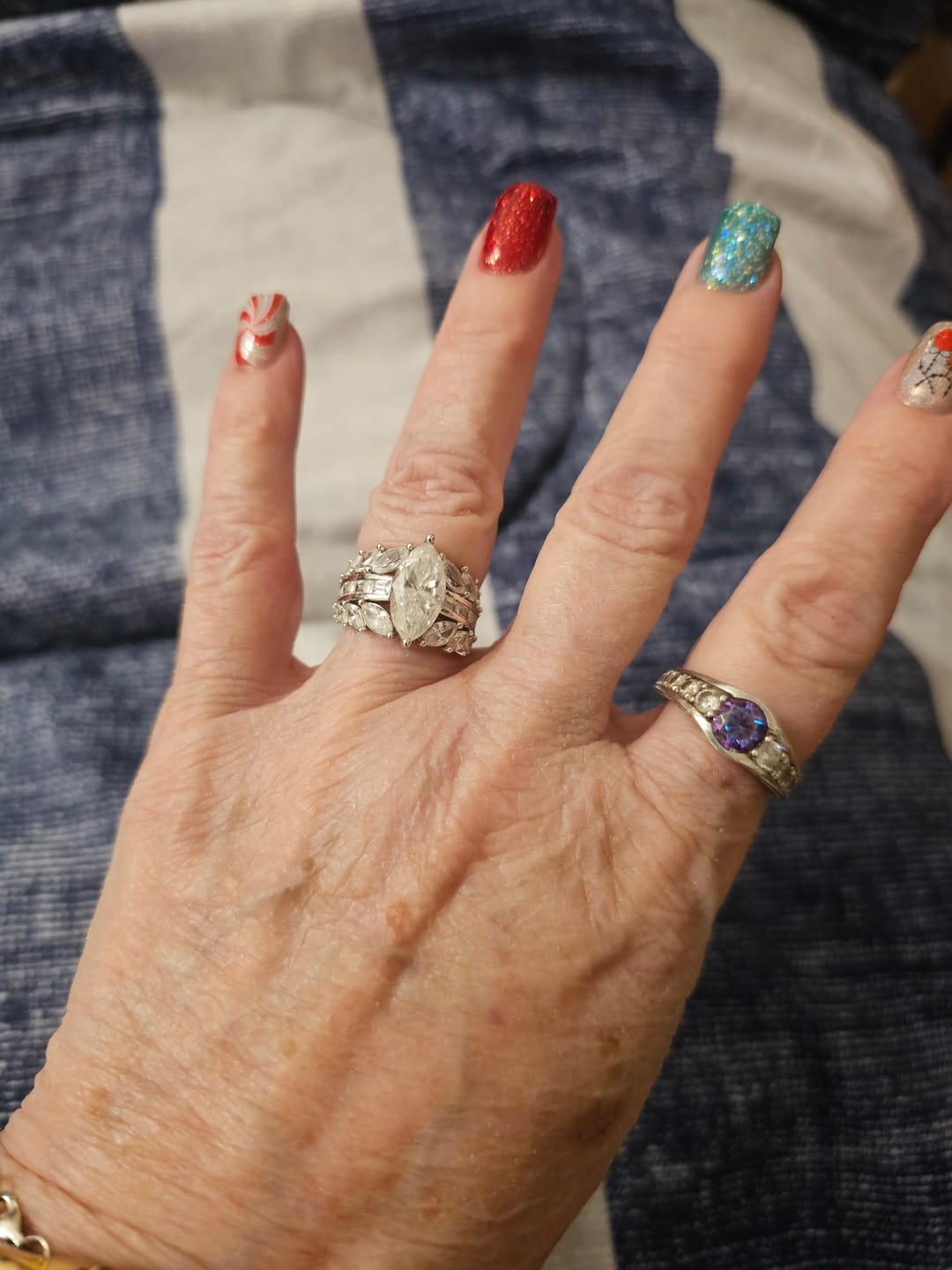 Customer photo review of Marquise Cut Moissanite And Enhanced Side Stone Engagement Ring