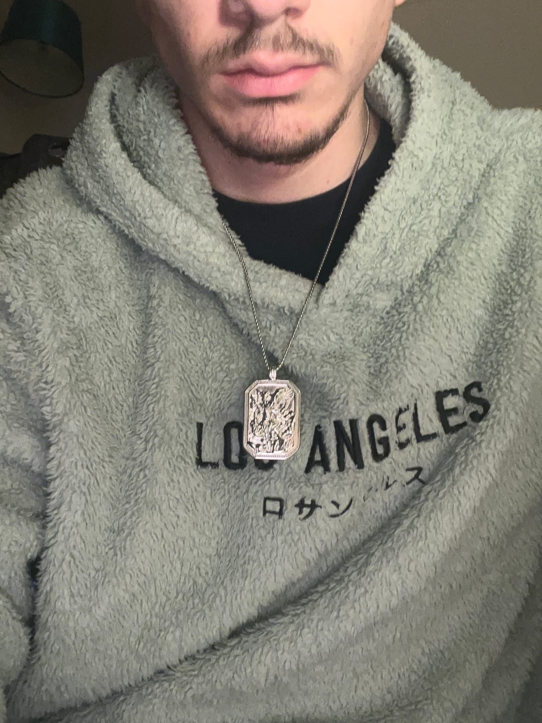 Customer photo review of FREE Today: Classic Style St. Michael the Archangel Protection Stainless Steel Pendant Necklace