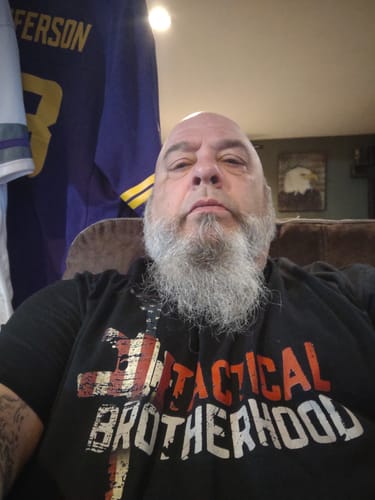 Reviewer wearing the black Tactical Brotherhood Official T-Shirt.