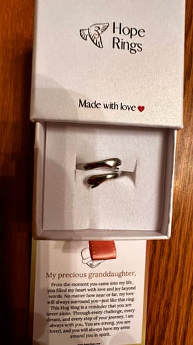 Customer's 'To My Granddaughter - Hug Ring' in its open 'Hope Rings' gift box with the message card showing.