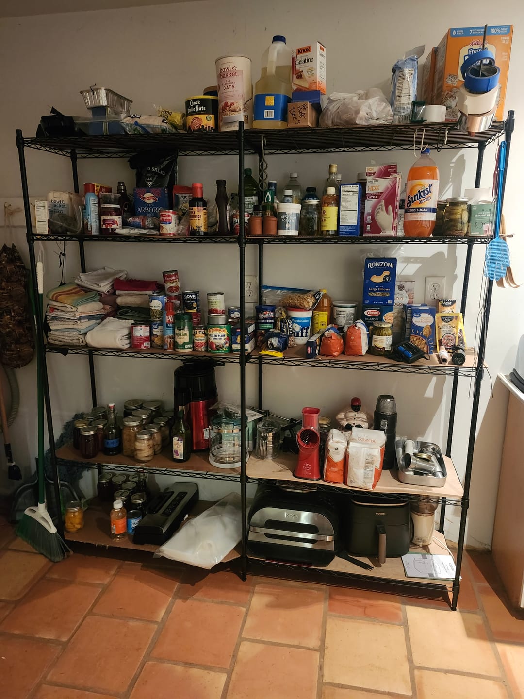 Customer photo review of REIBII 70"W Wire Shelving, 1600Lbs Metal L Shaped Shelves Adjustable, Storage Wire Racks for Pantry Kitchen