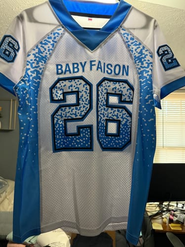 Customer's custom white and powder blue football jersey with 'BABY FAISON' and the number 26 on the front.