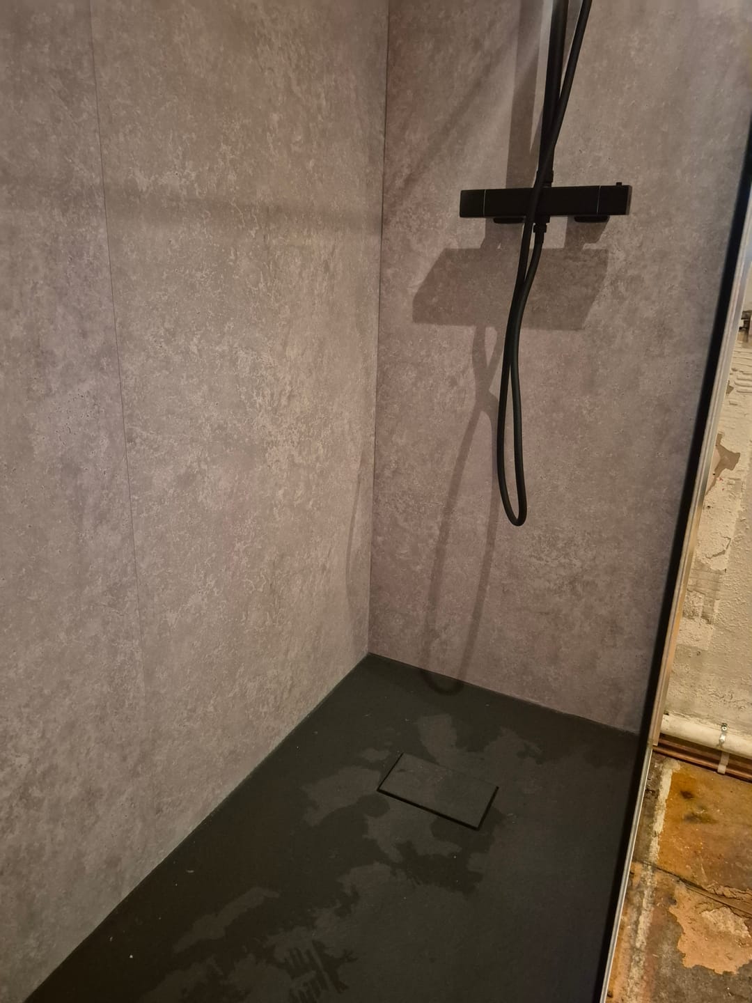 Customer photo review of Premium Beige Concrete Matt Shower Wall Panel – 1M x 2.4M