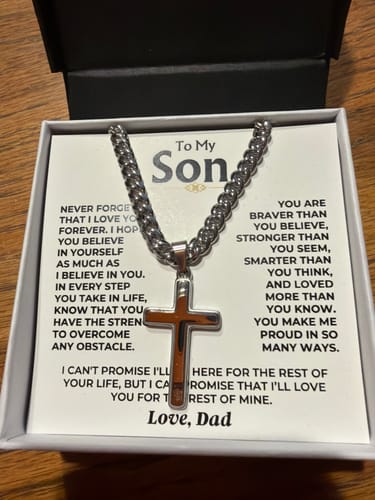 Customer's Artisan Cross on a Cuban Link Chain in its gift box with a 'To My Son' message card from Dad.