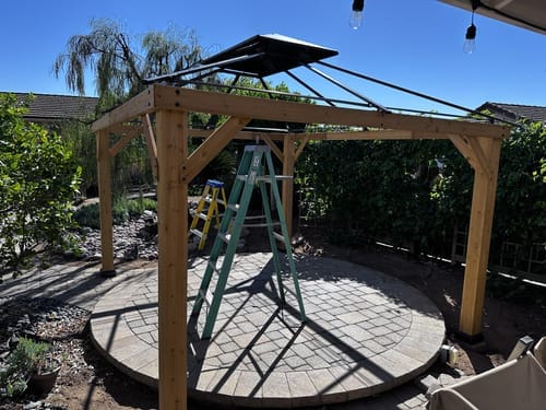Customer photo review of SUNJOY 10x12 Outdoor Cedar Framed Wooden Gazebo with 2-Tier Metal Roof and Ceiling Hook - Weathered Cedar