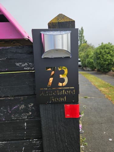 Customer photo review of WhareLite™ | Personalized Address Plaque