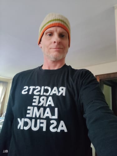 Customer photo review of Racists Are Lame Unisex T-Shirt