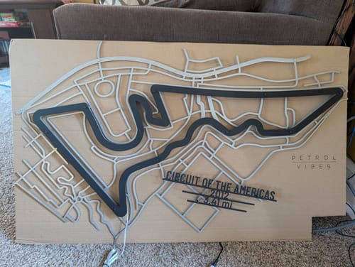 Customer photo review of Circuit of America COTA Metal Wall Art
