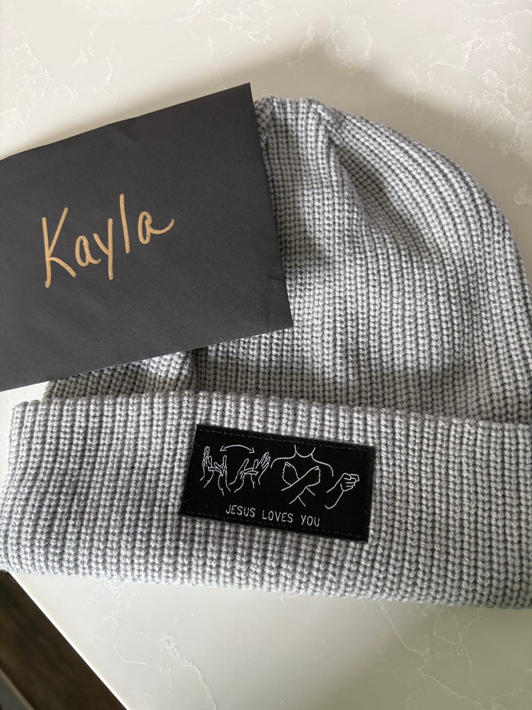 Customer photo review of JESUS LOVES YOU ASL BEANIE+