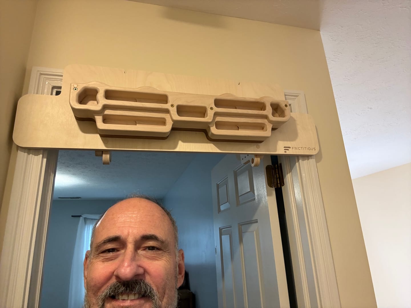 Customer photo review of Hangboard Doorway Mount