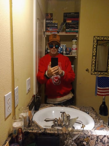 Customer photo review of Embroidered Infowars Premium Embroidered Hat