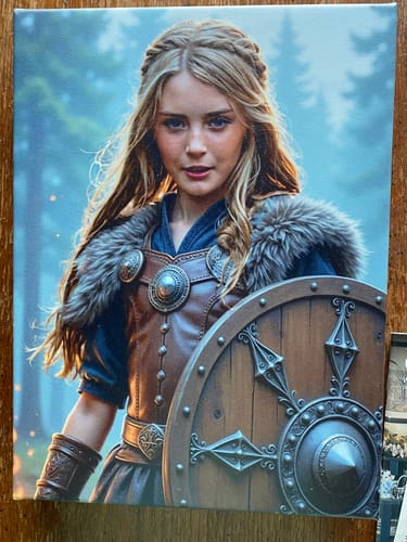 Customer's personalized Viking Shieldmaiden canvas portrait of a person in armor holding a round shield.