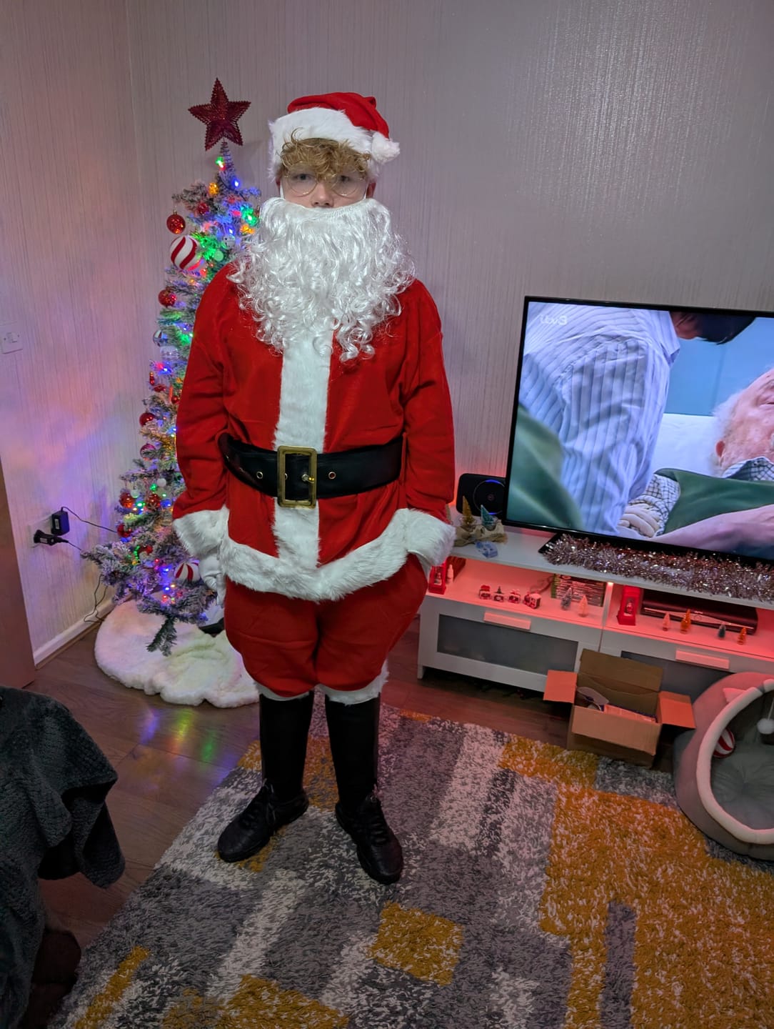 Customer photo review of Deluxe Santa Costume