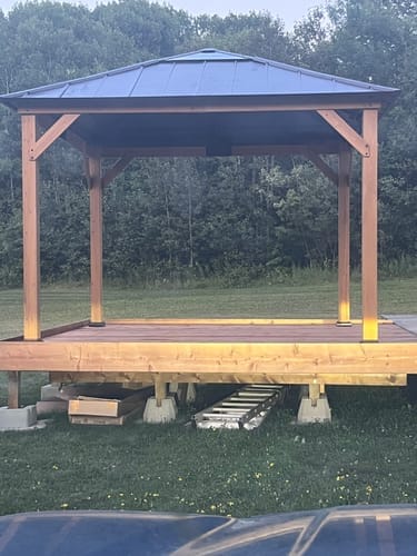 Customer photo review of SUNJOY Hard Top Gazebo, 11' x 11' Wooden Gazebo, Cedar Framed Gazebo with Steel Hip Roof and Polycarbonate Skylight