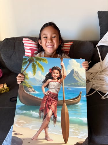 A smiling customer holding her personalized 'The Island Princess' portrait while sitting on a couch.