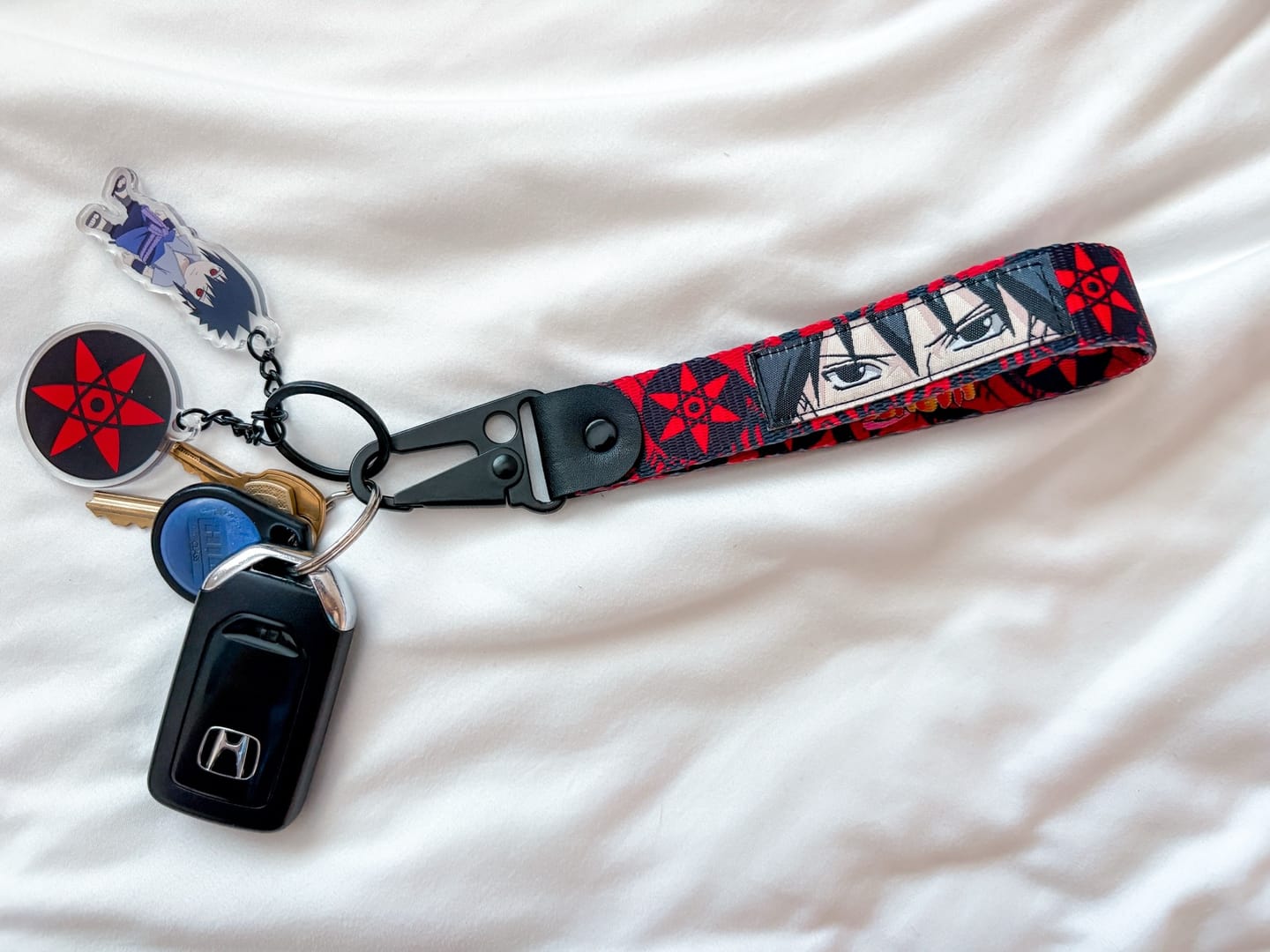 Customer photo review of Sasuke Sharingan Keystrap Bundle (Naruto Shippuden)