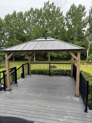 Customer photo review of SUNJOY 11x13 Wooden Gazebo with Solar Panel, LED Lights and Ceiling Hook - Weathered Cedar
