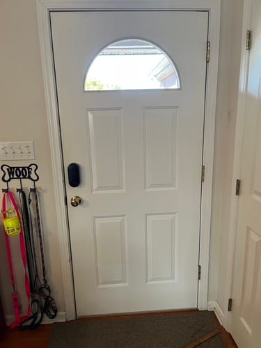 Reviewer's white door with the Clear 1 Lite Glass and Frame Kit (Fanlite) installed.