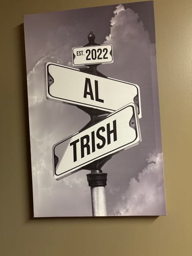 Customer's black-and-white COUPLES DATE OF LOVE canvas showing street signs customized with 'Al', 'Trish', and 'Est. 2022'.