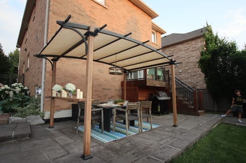 Customer photo review of SUNJOY Outdoor Patio 9x13 Modern Tan Metal Arched Pergola Kit with Bar Shelf